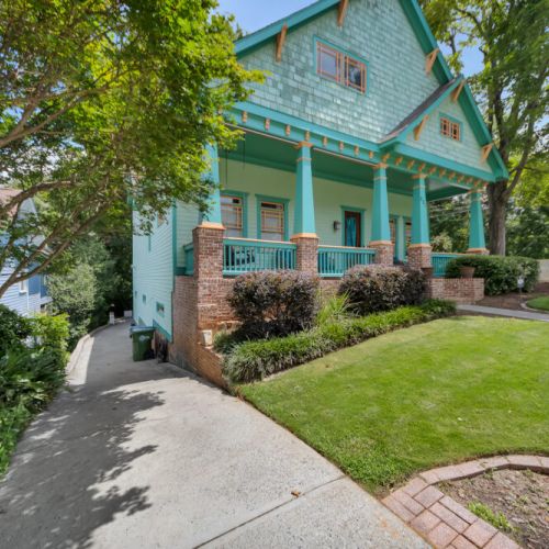 shake siding, a brick foundation